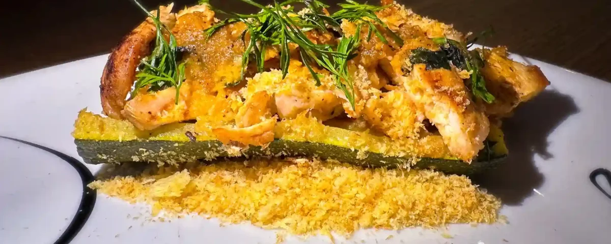 Spicy Zucchini Chicken Boat on a white plate