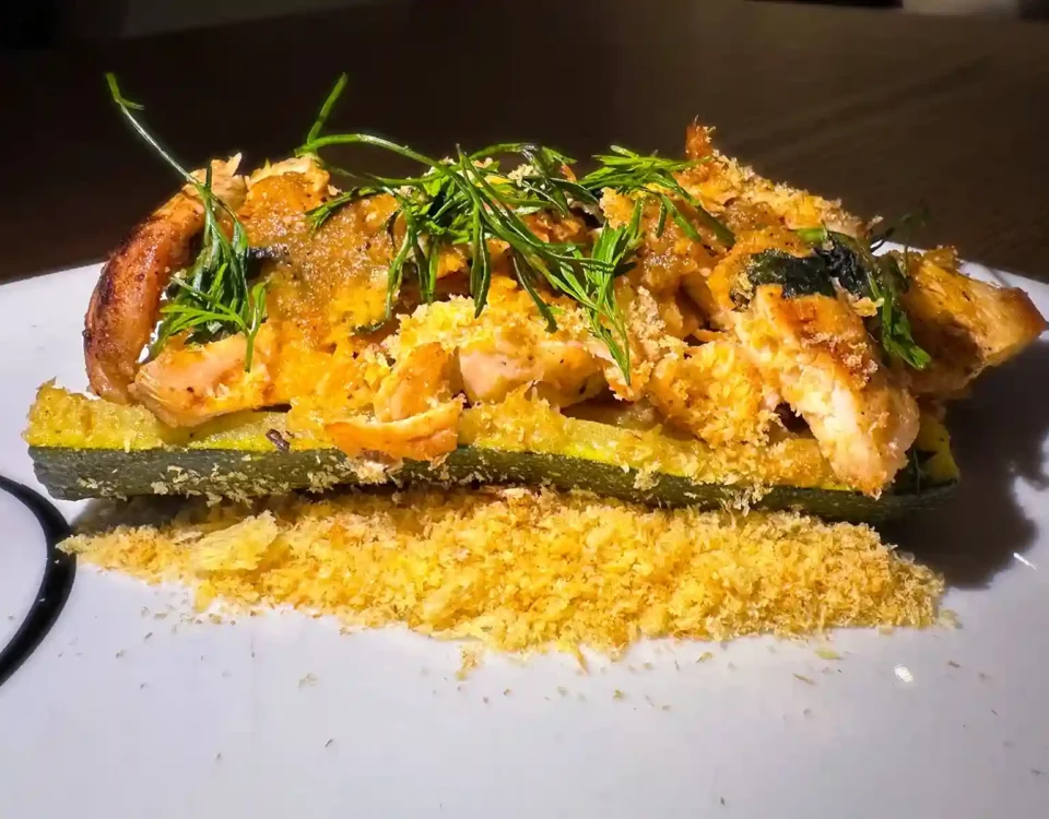 Spicy Zucchini Chicken Boat on a white plate